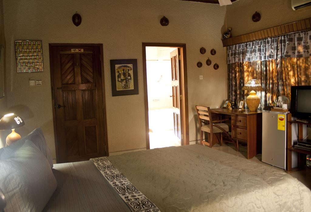 Four Villages Inn Kumasi Oda fotoğraf